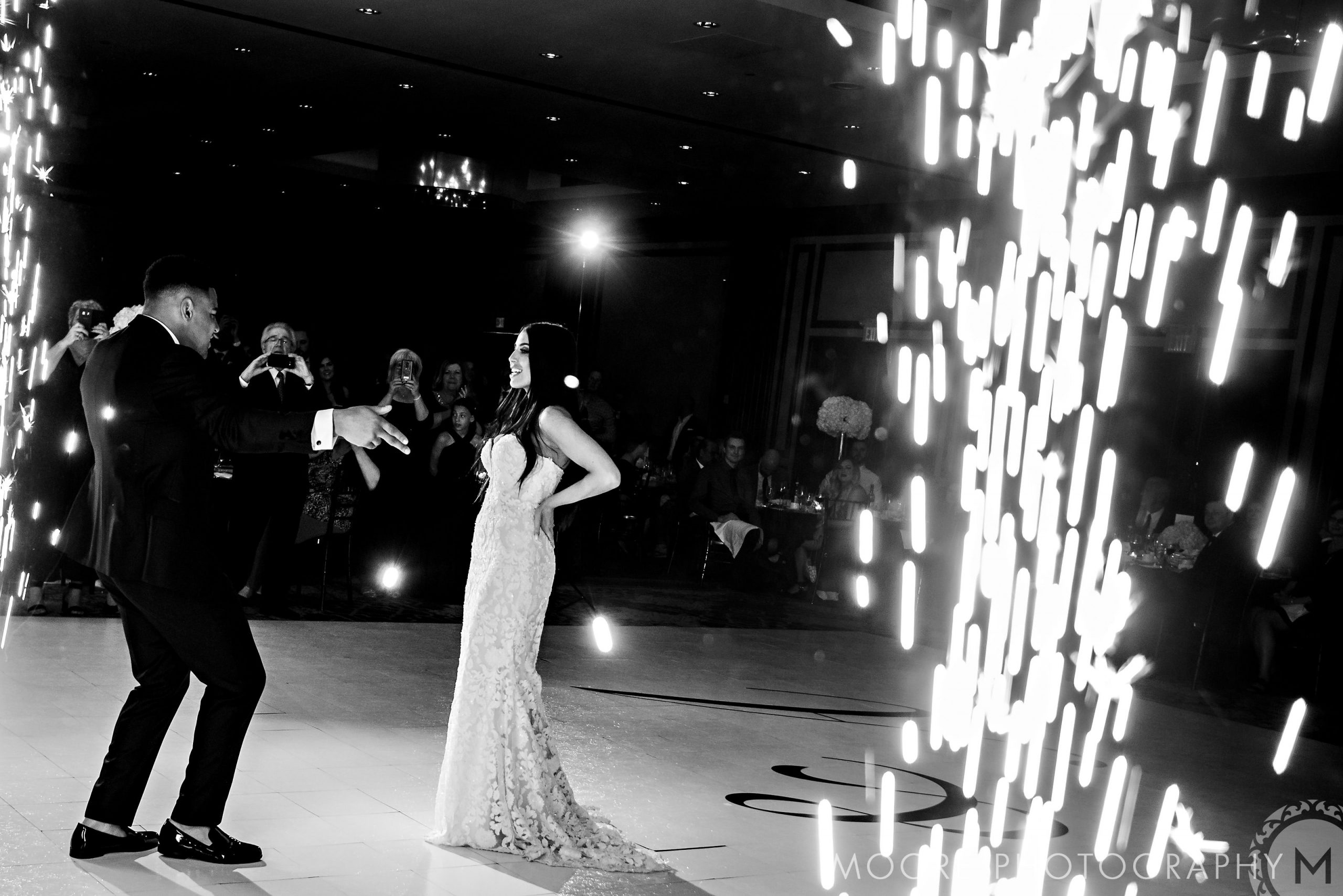 Andrew Harris and his bride danced joyfully surrounded by bright sparklers.