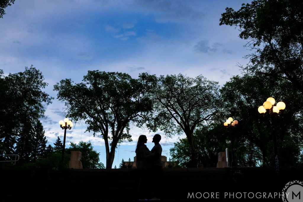 Silhouette of an engaged couple during sunset with trees in Winnipeg Manitoba