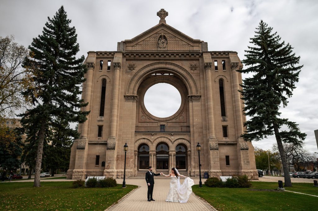Saint Boniface Cathedral - bride and groom, dancing for a wedding photo