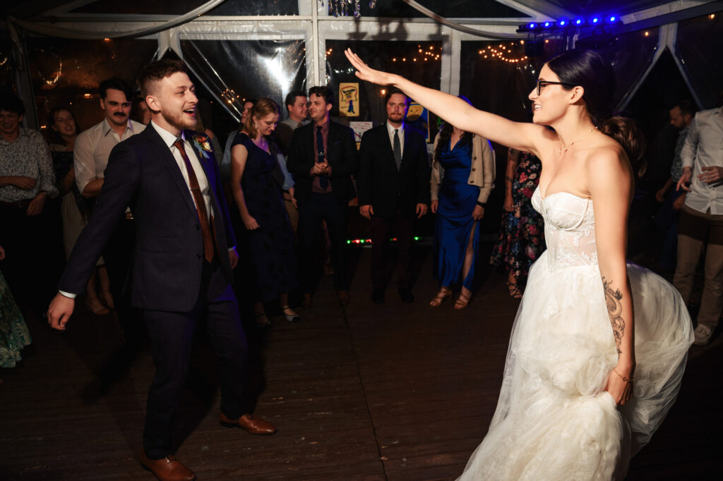 A bride and groom dancing at their wedding reception