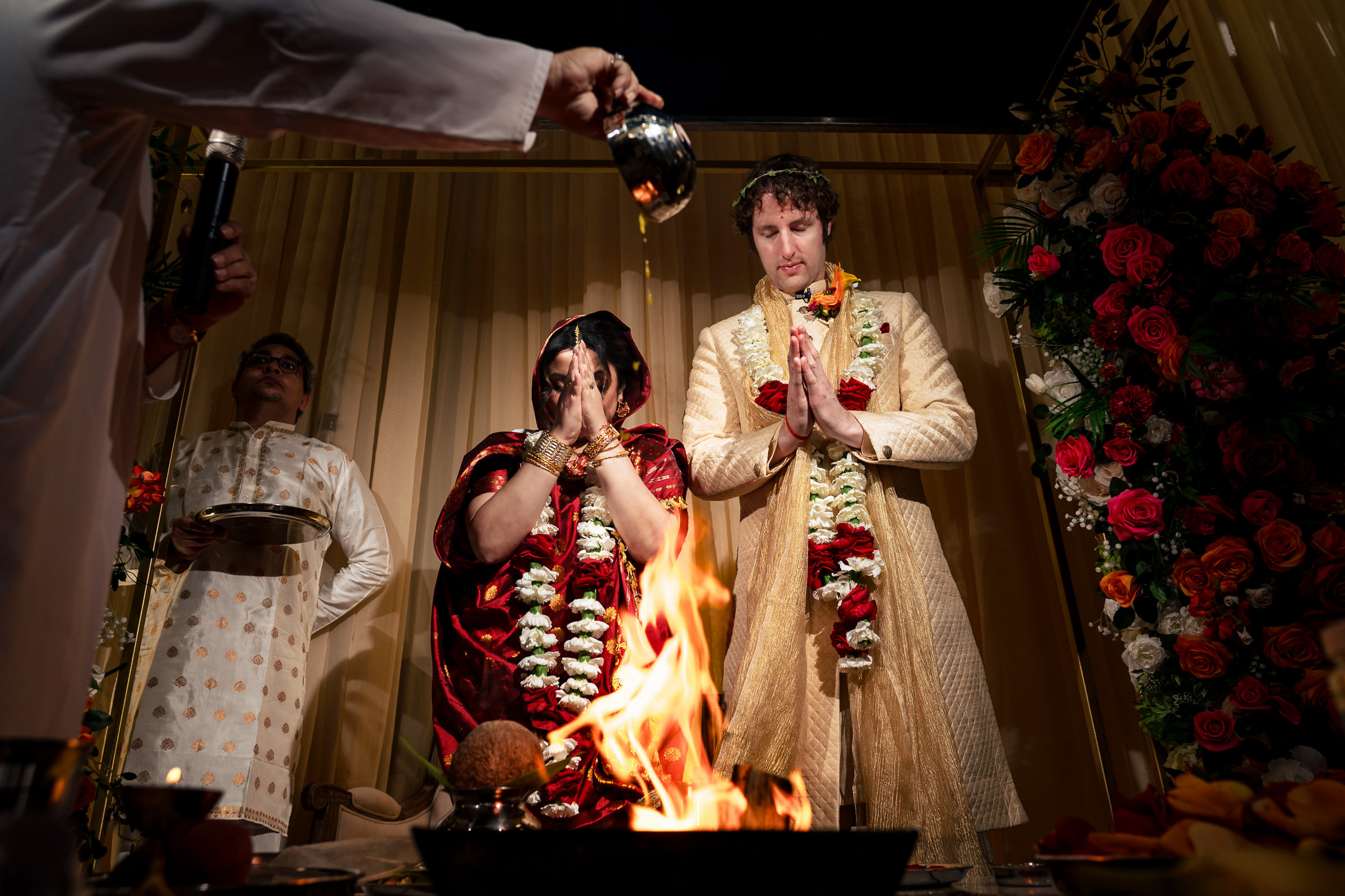 Winnipeg wedding ceremony with a couple in ceremonial attire by a ritual fire.