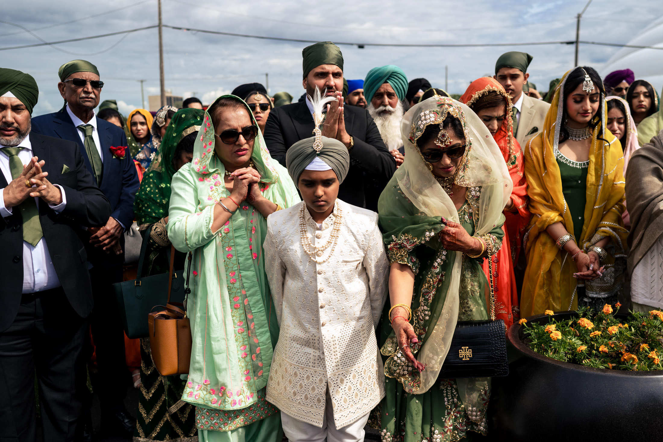 A group in traditional attire attends an outdoor Sikh gathering in Winnipeg.