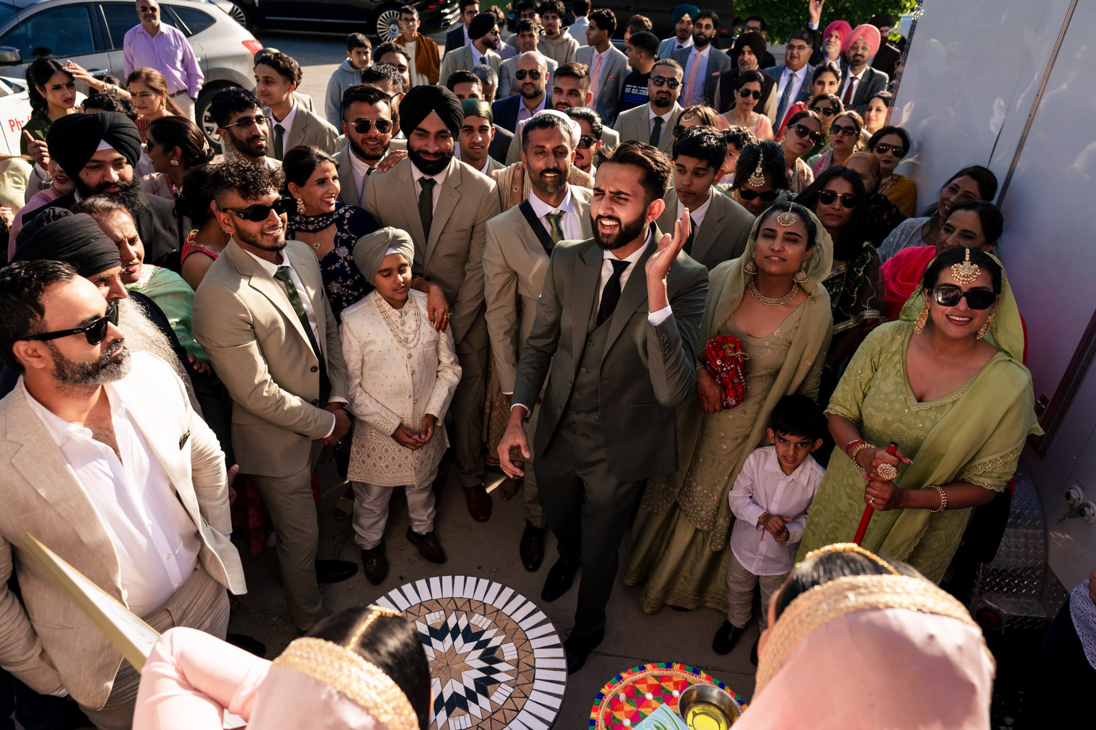 A festive gathering in elegant attire at an outdoor Winnipeg wedding.