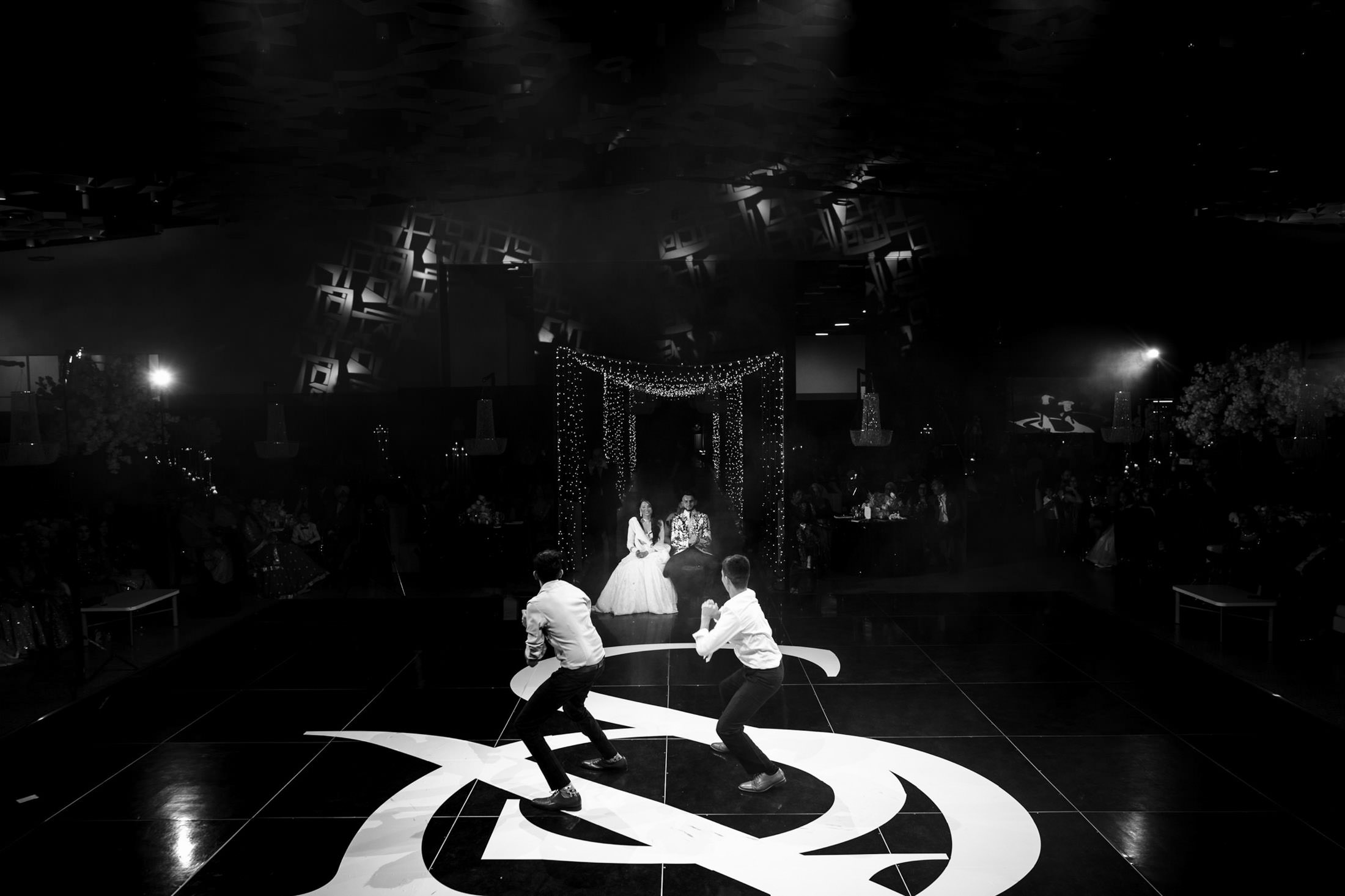 Two dancers performing at a vibrant Winnipeg wedding reception.