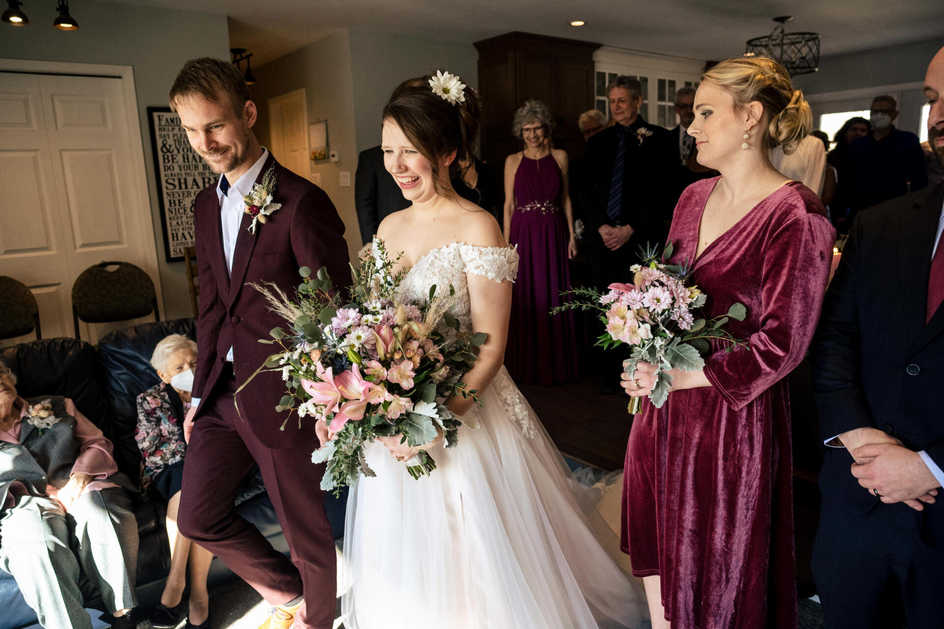 Bride and groom beam at indoor wedding, best Winnipeg wedding photos capturing the joy.