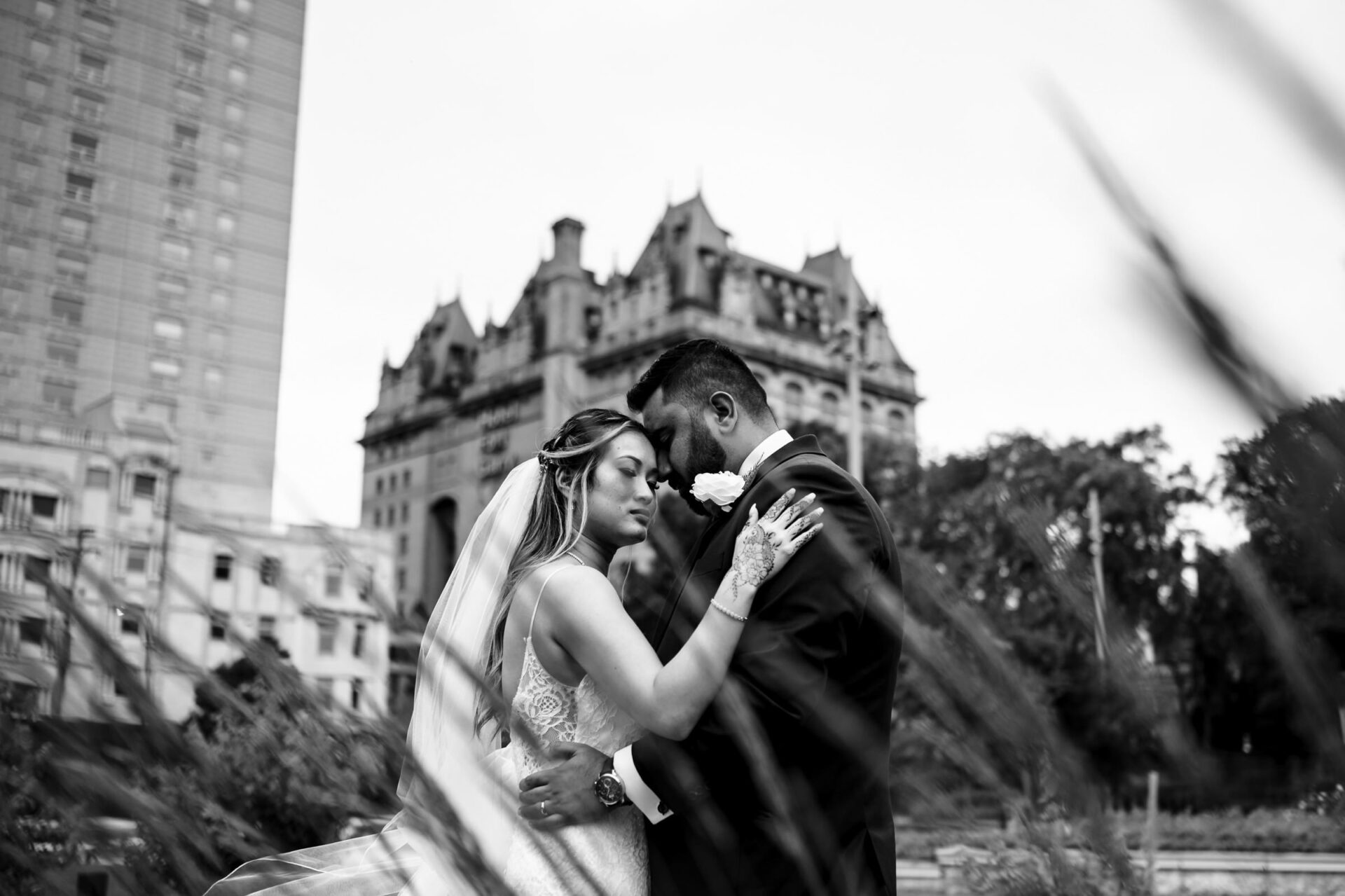 A couple embraces, capturing the essence of Best Winnipeg Wedding Photos.