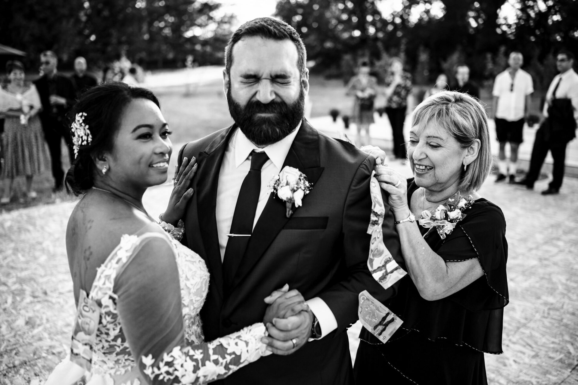 Best Winnipeg Wedding Photos: Bride and groom holding hands; groom makes a funny face.