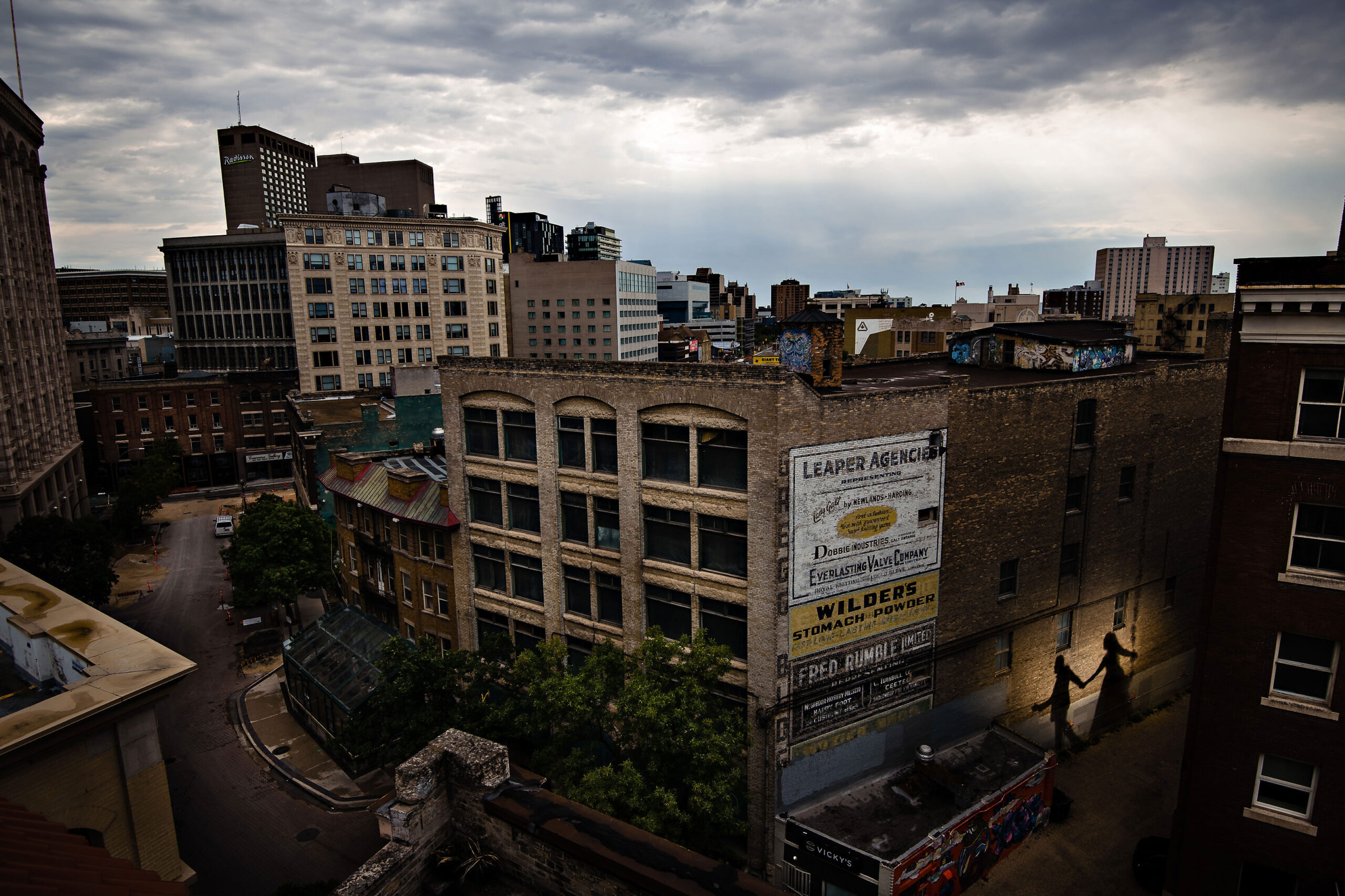 Urban skyline with historic buildings, perfect for a Winnipeg wedding photography backdrop.